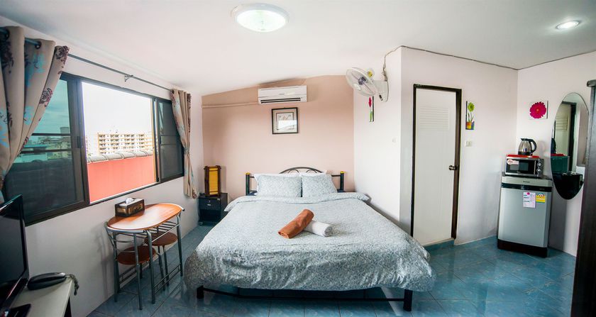 Imagen de la habitación del Hotel Pattaya Holiday Lodge. Foto 7