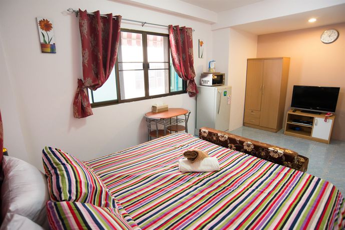 Imagen de la habitación del Hotel Pattaya Holiday Lodge. Foto 15