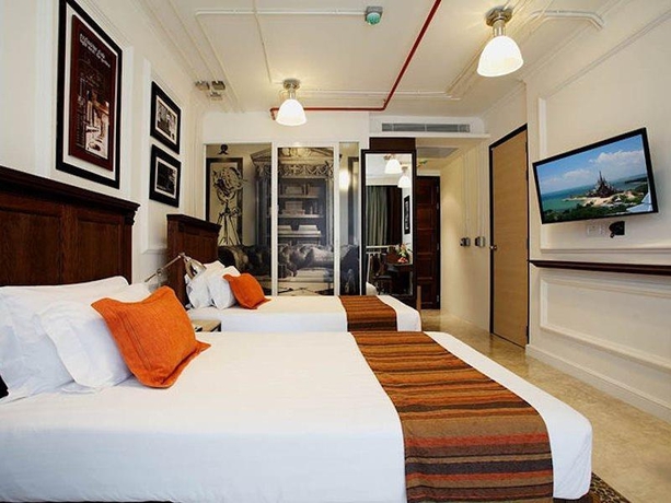Imagen de la habitación del Hotel Pattaya Modus Beachfront Resort. Foto 9