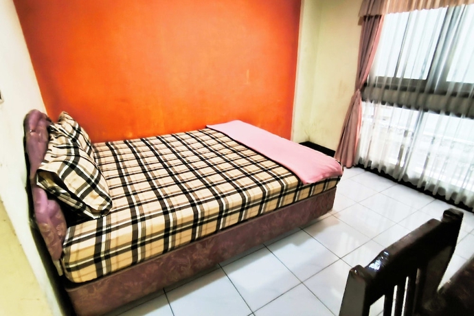 Imagen de la habitación del Hotel Pattimura powered by Cocotel. Foto 2