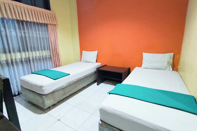 Imagen de la habitación del Hotel Pattimura powered by Cocotel. Foto 4