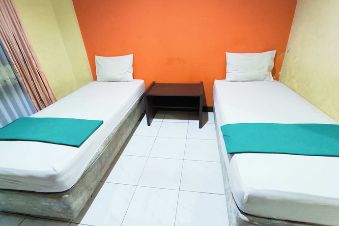 Imagen de la habitación del Hotel Pattimura powered by Cocotel. Foto 5