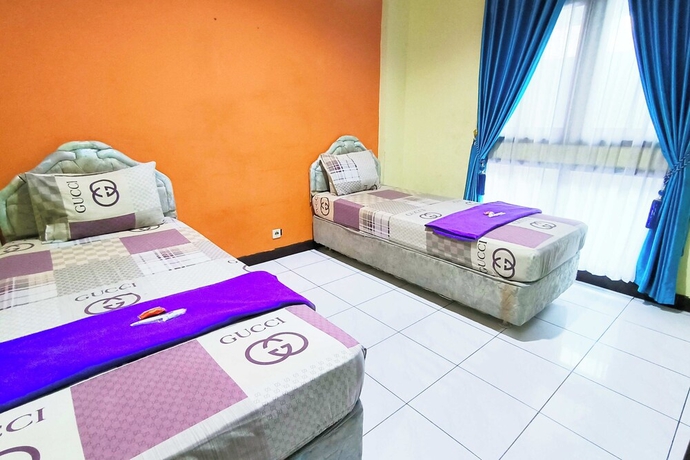 Imagen de la habitación del Hotel Pattimura powered by Cocotel. Foto 7