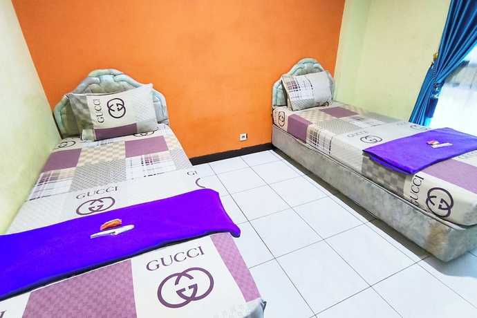 Imagen de la habitación del Hotel Pattimura powered by Cocotel. Foto 9