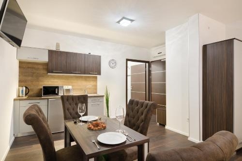 Imagen de la habitación del Hotel Paulay Downtown Apartments. Foto 6