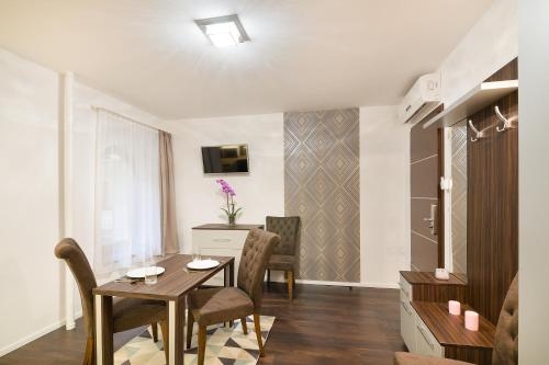 Imagen de la habitación del Hotel Paulay Downtown Apartments. Foto 8