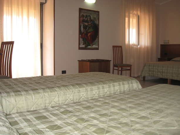 Imagen de la habitación del Hotel Pausania Inn. Foto 7