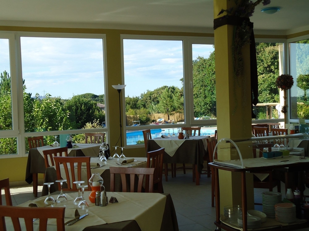 Imagen del bar/restaurante del Hotel Pausania Inn. Foto 5