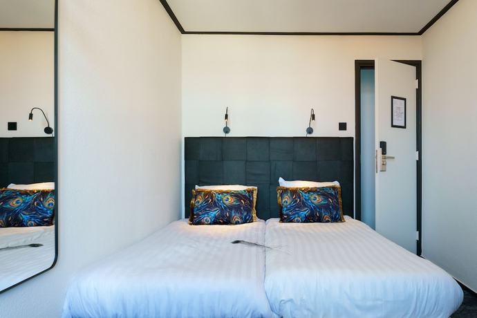 Imagen de la habitación del Hotel Pauw. Foto 9