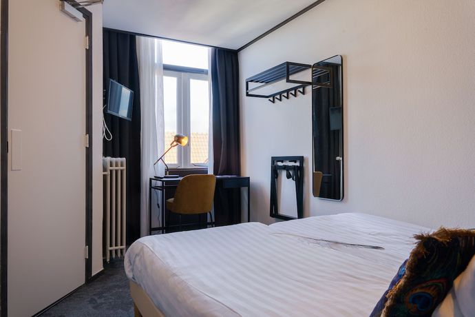 Imagen de la habitación del Hotel Pauw. Foto 17