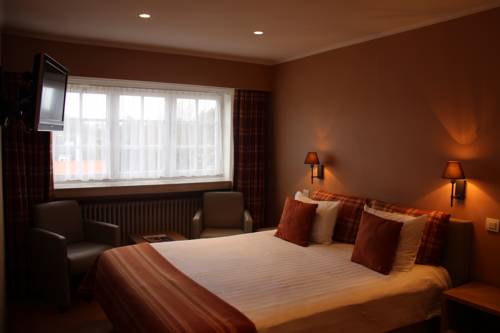 Imagen de la habitación del Hotel Pavillon Du Zoute. Foto 7