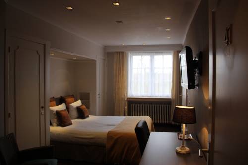 Imagen de la habitación del Hotel Pavillon Du Zoute. Foto 8