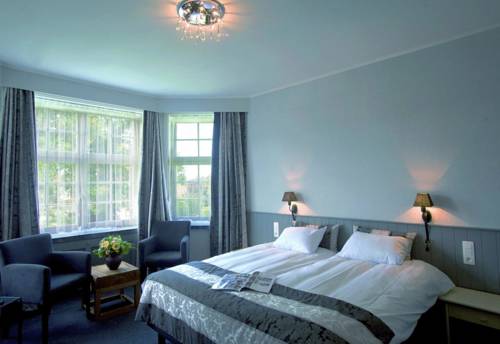 Imagen de la habitación del Hotel Pavillon Du Zoute. Foto 13