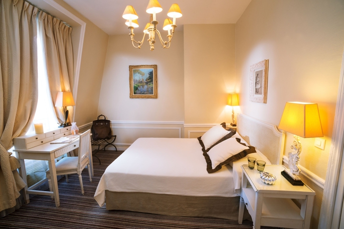 Imagen de la habitación del Hotel Pavillon Henri Iv – Restaurant Terrasse. Foto 7