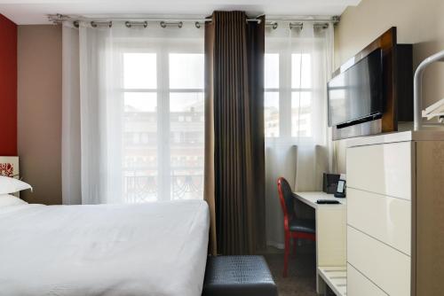 Imagen de la habitación del Hotel Pavillon Nation. Foto 13