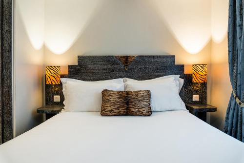 Imagen de la habitación del Hotel Pavillon Opera Grands Boulevards. Foto 6