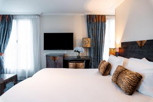 Imagen de la habitación del Hotel Pavillon Opera Grands Boulevards. Foto 9