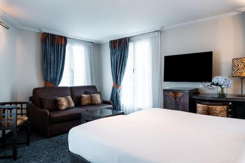 Imagen de la habitación del Hotel Pavillon Opera Grands Boulevards. Foto 11