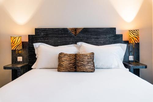 Imagen de la habitación del Hotel Pavillon Opera Grands Boulevards. Foto 17