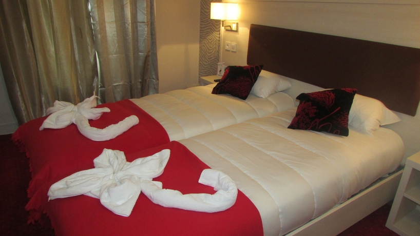 Imagen de la habitación del Hotel Pavillon Opera Lafayette. Foto 7