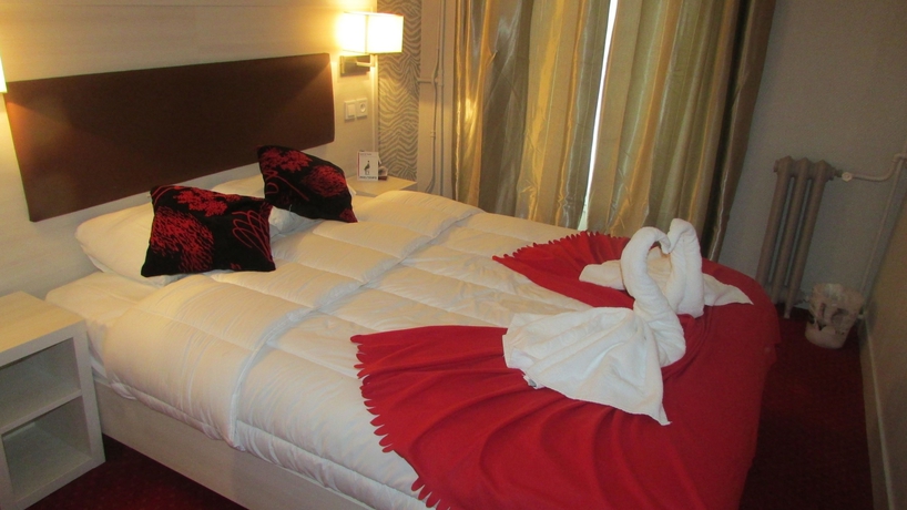 Imagen de la habitación del Hotel Pavillon Opera Lafayette. Foto 9