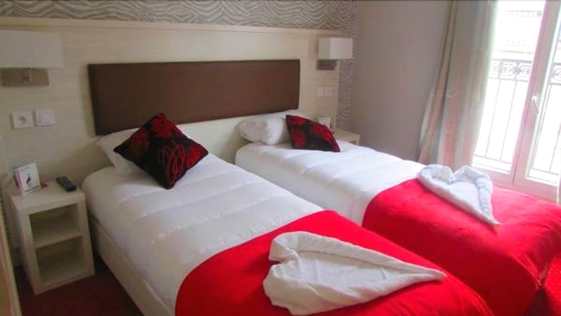 Imagen de la habitación del Hotel Pavillon Opera Lafayette. Foto 14