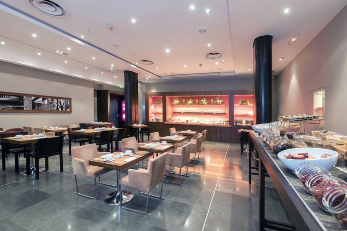 Imagen del bar/restaurante del Hotel Pavillon Regent Petite France. Foto 7