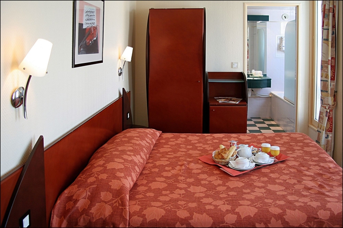 Imagen de la habitación del Hotel Pavillon Villiers Etoile. Foto 12