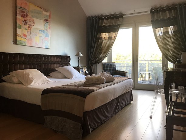 Imagen de la habitación del Hotel Pavillon du Chateau. Foto 5
