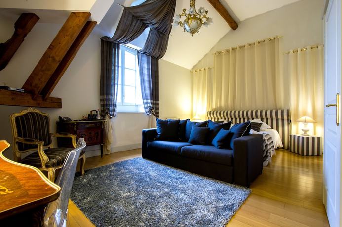 Imagen de la habitación del Hotel Pavillon du Chateau. Foto 8