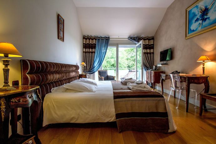 Imagen de la habitación del Hotel Pavillon du Chateau. Foto 15