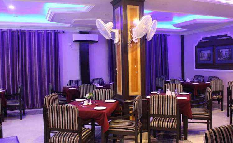 Imagen del bar/restaurante del Hotel Pawan International. Foto 7