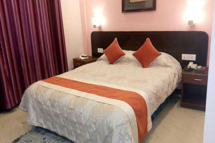 Imagen de la habitación del Hotel Pawan International. Foto 11