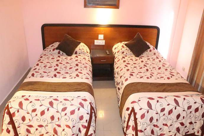 Imagen de la habitación del Hotel Pawan International. Foto 12