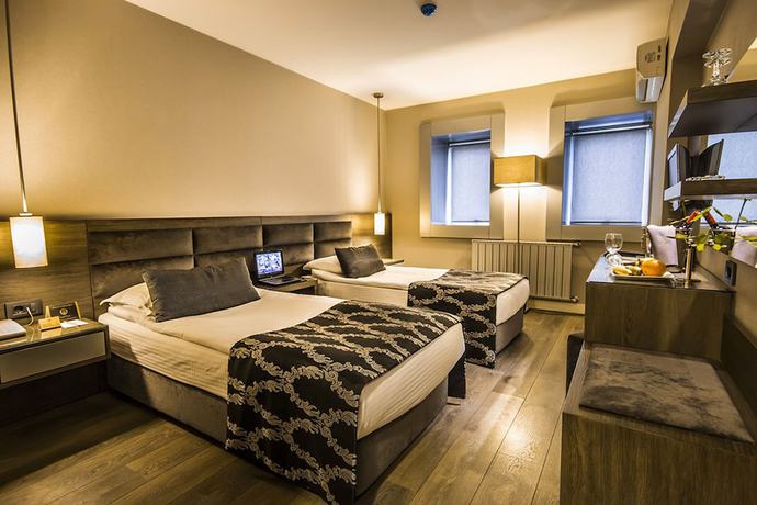 Imagen de la habitación del Hotel Pawan International. Foto 14