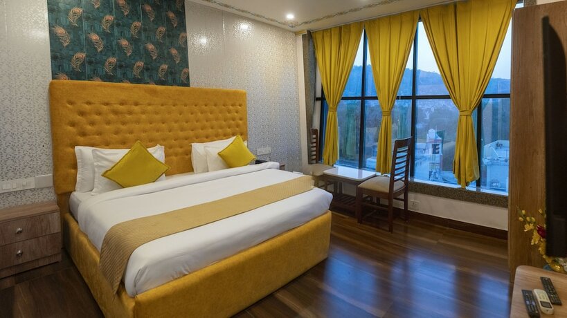 Imagen de la habitación del Hotel Pax Grand Blue Udaipur. Foto 15
