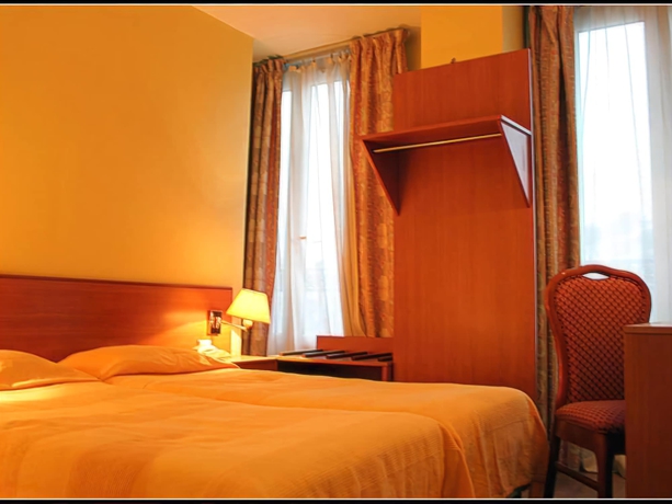 Imagen de la habitación del Hotel Pax Paris 18e. Foto 6