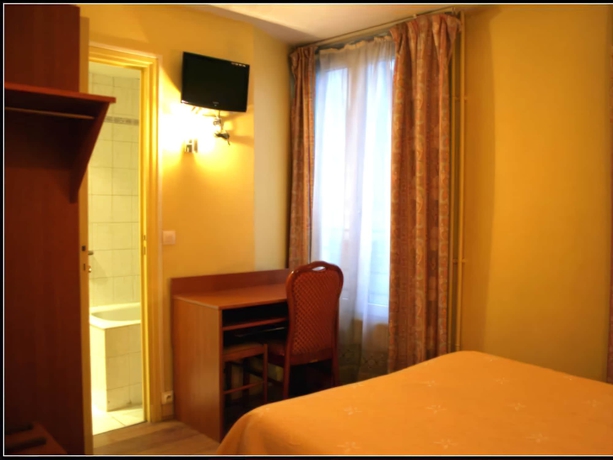 Imagen de la habitación del Hotel Pax Paris 18e. Foto 9