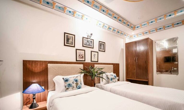 Imagen de la habitación del Hotel Pax Rafahiya Haveli Udaipur. Foto 17