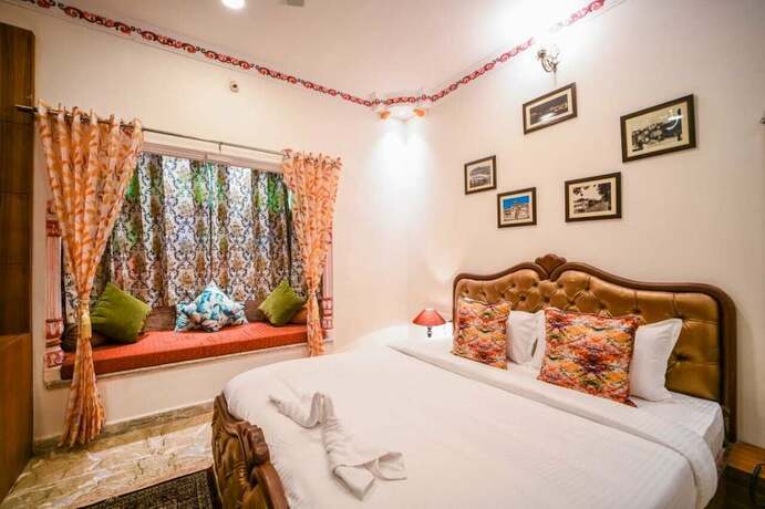 Imagen de la habitación del Hotel Pax Rafahiya Haveli Udaipur. Foto 18