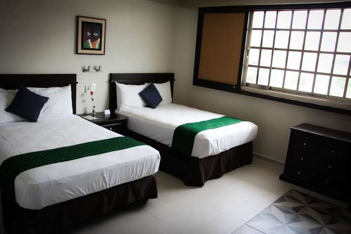 Imagen de la habitación del Hotel Pa'xa Mama Boutique. Foto 11