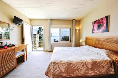 Imagen de la habitación del Hotel Paxos Beach. Foto 18