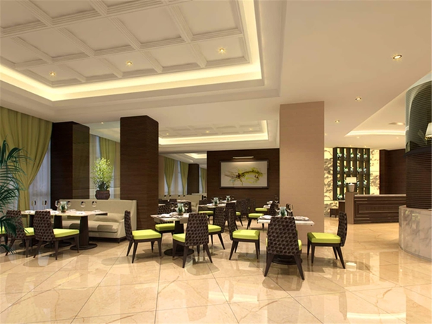 Imagen del bar/restaurante del Hotel Paxton Vacances Hotels and Resorts Sanya. Foto 7