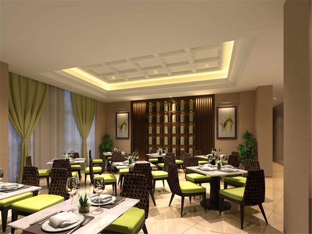 Imagen del bar/restaurante del Hotel Paxton Vacances Hotels and Resorts Sanya. Foto 10