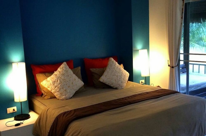 Imagen de la habitación del Hotel Payam Cottage Resort. Foto 11