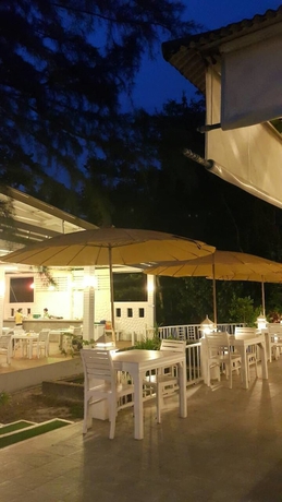 Imagen del bar/restaurante del Hotel Payam Cottage Resort. Foto 2