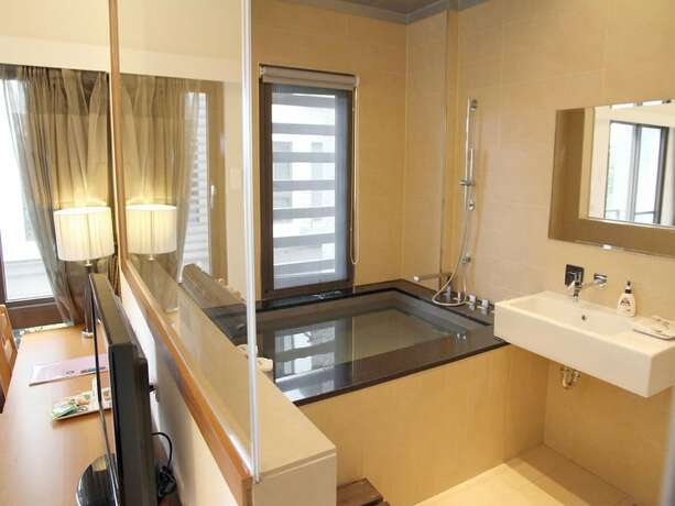 Imagen de la habitación del Hotel Peace Area Hot Spring. Foto 25