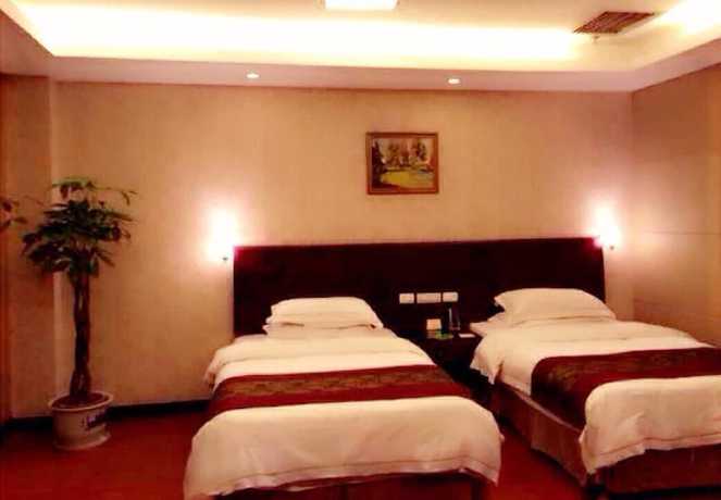 Imagen de la habitación del Hotel Peace International Hotel - Shangrao. Foto 2