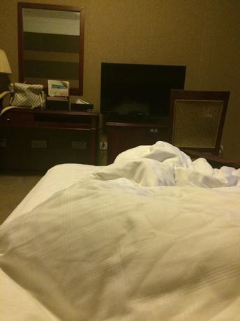 Imagen de la habitación del Hotel Peace International Hotel - Shangrao. Foto 7