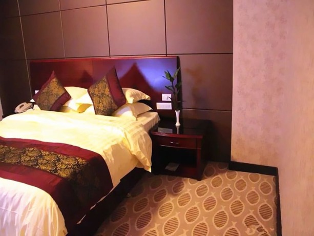 Imagen de la habitación del Hotel Peace International Hotel - Shangrao. Foto 8